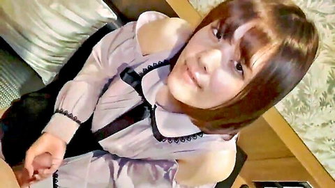 Cute Japanese girl in off-shoulder lace blouse smiling teasingly with natural tits hinted