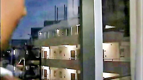 Twilight exterior of rural Japanese building in adult video scene