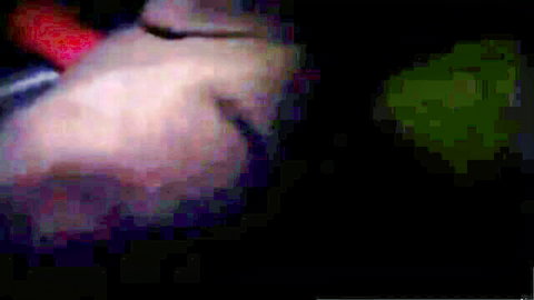 Kneeling woman in fraternity initiation blowjob scene