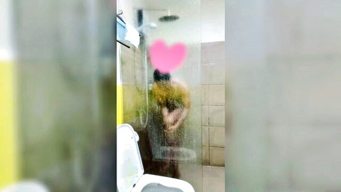 Hot Zacarias steamy shower tease behind pink heart glass