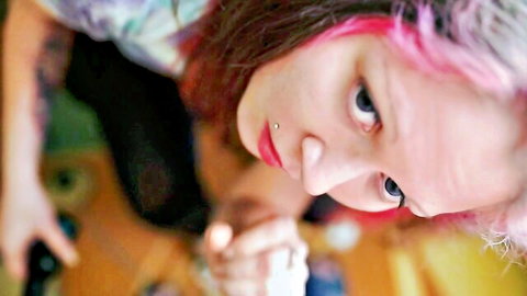 Pink-haired vixen teases with tugjob and footjob in socks HD