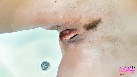 Close-up of busty MILF peeing in shower, hairy view