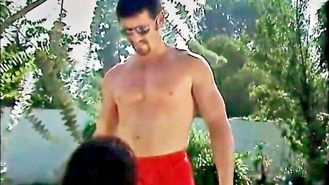 Muscular stud in red trunks with busty brunette outdoors, hairy pussy ass fuck preview
