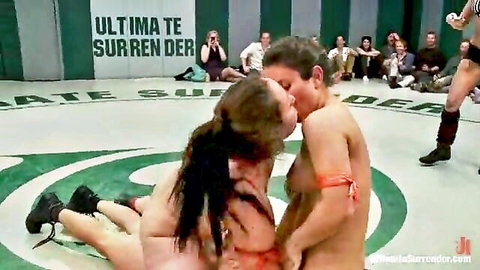 Fit babes in intense lesbian wrestling match, passionate kiss and pin