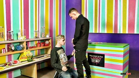 Reece Bentley gets deep oral from Jonny Castle in gay candy shop scene