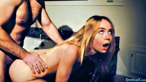 Muscular stud grabs blonde babe's bare ass from behind in rough bathroom doggy style over sink