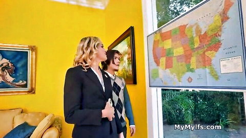 Blonde campaign manager in suit eyes map with colleague, freeuse tease