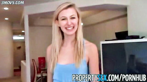 Alexa Grace stunning blonde real estate agent in blue tank top smiling