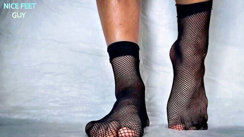 Hot white gay guy feet in black fishnet stockings for foot worship tease