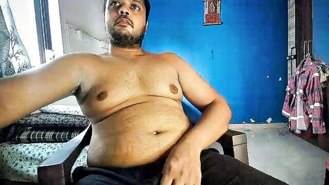 Chubby bearded Indian man shirtless showing hairy chest and belly on webcam