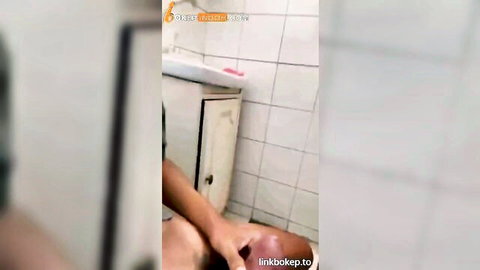 Indonesian amateur sibling roleplay in bathroom, hand on thigh intimate touch