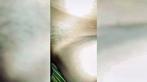 Blurry closeup of hairy male groin with cum drip from anus