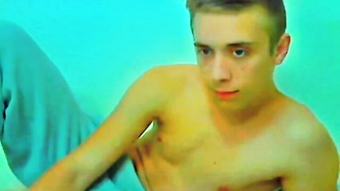 Cute young twink guy shirtless in sweatpants, teasing body and bulge