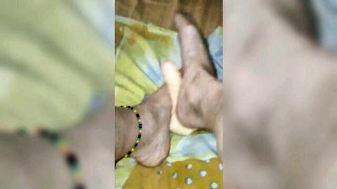 Indian woman's feet with anklet teasing hard cock in foot fetish scene