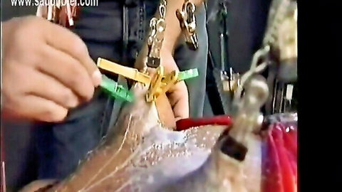 Busty Latina punished with nipple clamps, moaning in BDSM play