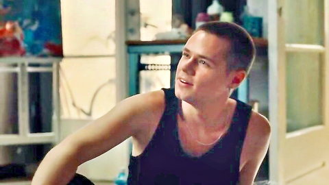 Young man in tank top looking sideways, sexy scene from 2DEZIT s03e01