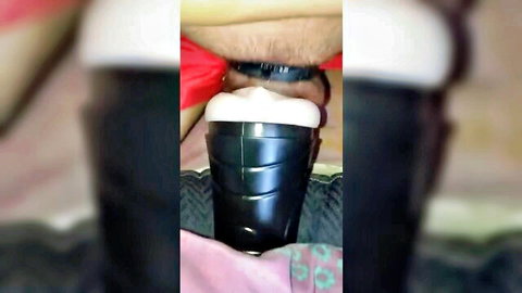 Man using black fleshlight sex toy until creamy cumshot close-up