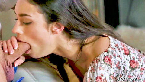 Brunette babe passionately sucks man's fingers deep in mouth during intimate foreplay.