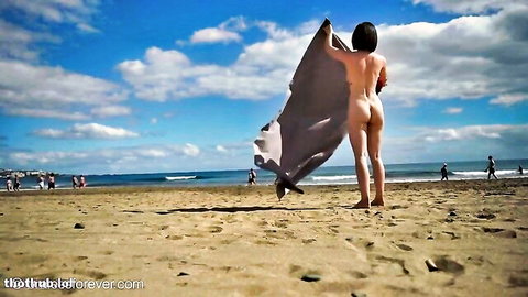 Eve Sweet naked on beach, holding towel, bare ass view outdoor