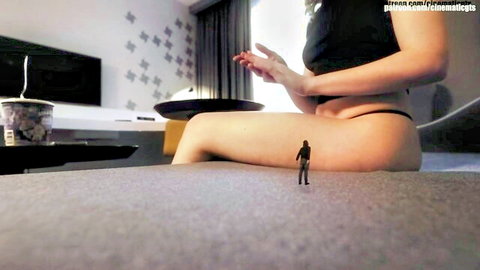 Giantess Vanessa teases tiny man in black thong on bed