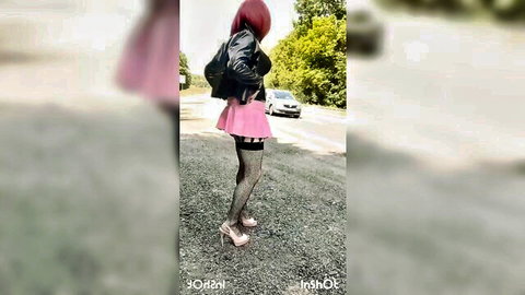 French sissy Sophie in leather jacket, pink mini skirt, stockings on roadside
