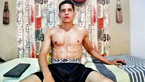 Steven_x94 muscular Latino brunette in striptease pose, shirtless on bed