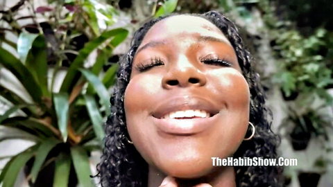 Hollybombom ebony beauty in see-through orange gives fetish handjob to big cock