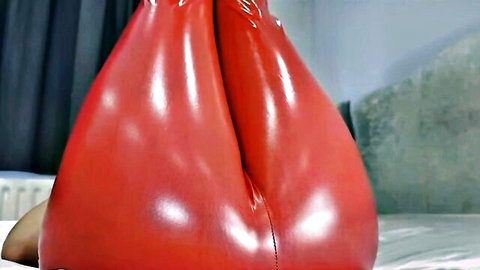 Curvy woman in shiny red leggings, bent over with inflated ass from powerful fart, solo fetish