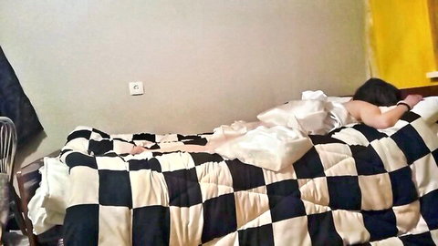 Asian bride in white lingerie lying face down on bed, teasing anal pledge