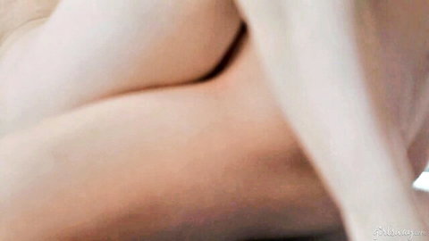 Explicit Kait in white lingerie and stockings, teasing close-up