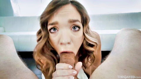 Katie Kush performs intense blowjob on Mick Blue, eyes wide in passion
