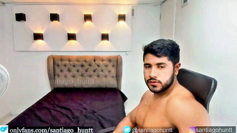 Muscular Latino hunk shirtless teasing bulge on webcam