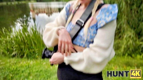 Daruma Rai in sexy blue off-shoulder top with camera outdoors