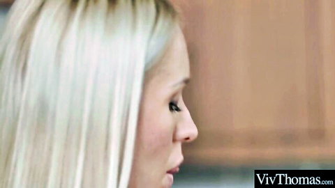 Profile of sexy blonde in white blouse from hot lesbian office encounter