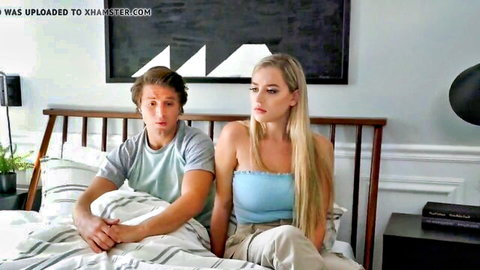 Blonde stepsister and stepbrother on bed in intimate tense moment before creampie