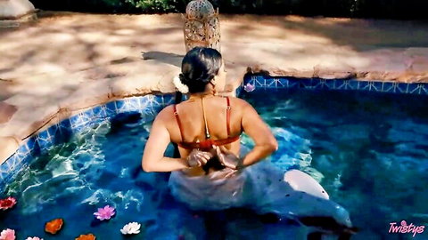 Jasmine Sherni in red bikini lounging seductively in pool