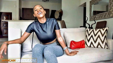 Smiling ebony model with huge tits in leather crop top seduces producer