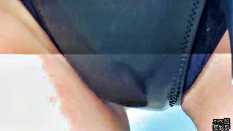 Closeup of wet shaved Japanese pussy with black latex panties pulled aside exposing glistening lips