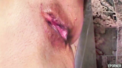 Close-up of woman's stretched lips wrapped around thick cock in sloppy blowjob