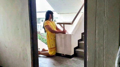 Indian woman in yellow suit kneeling solo masturbation tease