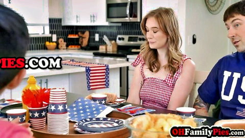 Blonde cougar in checkered dress at family table with teen, patriotic theme