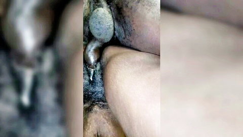 Close-up of black MILF's wet, aroused vagina