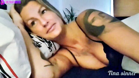 Tina Sinner in black lace bra, seductive bedroom pose