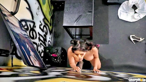 Petite Asian with small tits and pigtails sucks huge BBC through gloryhole on all fours