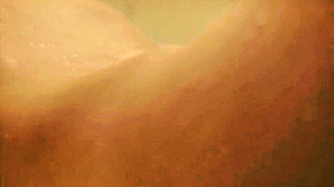 Annie Charlotte nude tits in explicit bathroom scene from Earthworm (2022)