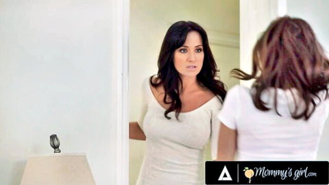 Angela Sommers and Jenna Sativa in tense mirror stare, white tops, Mommy's Girl lesbian preview