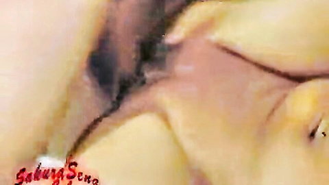 Sakura Sena's massive fake tits squeezed with cumshot