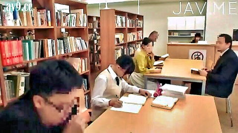 Japanese woman giving sneaky blowjob under library table in public with studying onlookers