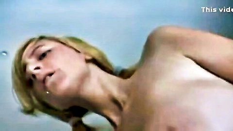 Blonde teen with huge tits in sensual arched pose
