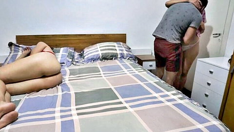 Sneaky cum on exposed Asian sister-in-law while hugging unaware wife